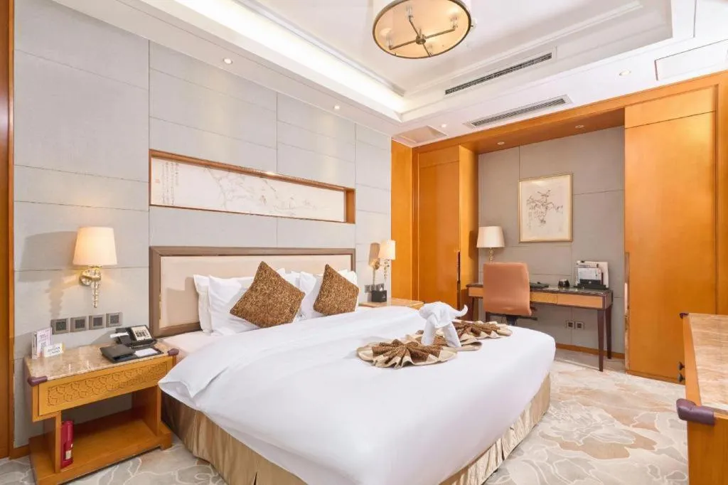 Bed in Mingdu Ziwei Garden Hotel