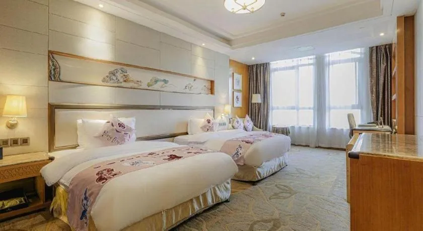 Bed in Mingdu Ziwei Garden Hotel