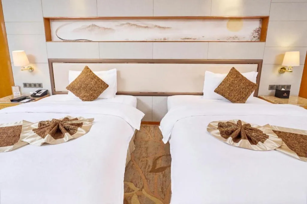 Bed in Mingdu Ziwei Garden Hotel