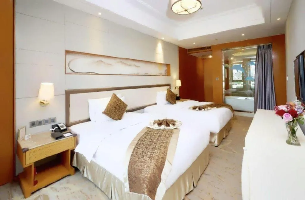 Bed in Mingdu Ziwei Garden Hotel