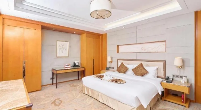 Bed in Mingdu Ziwei Garden Hotel