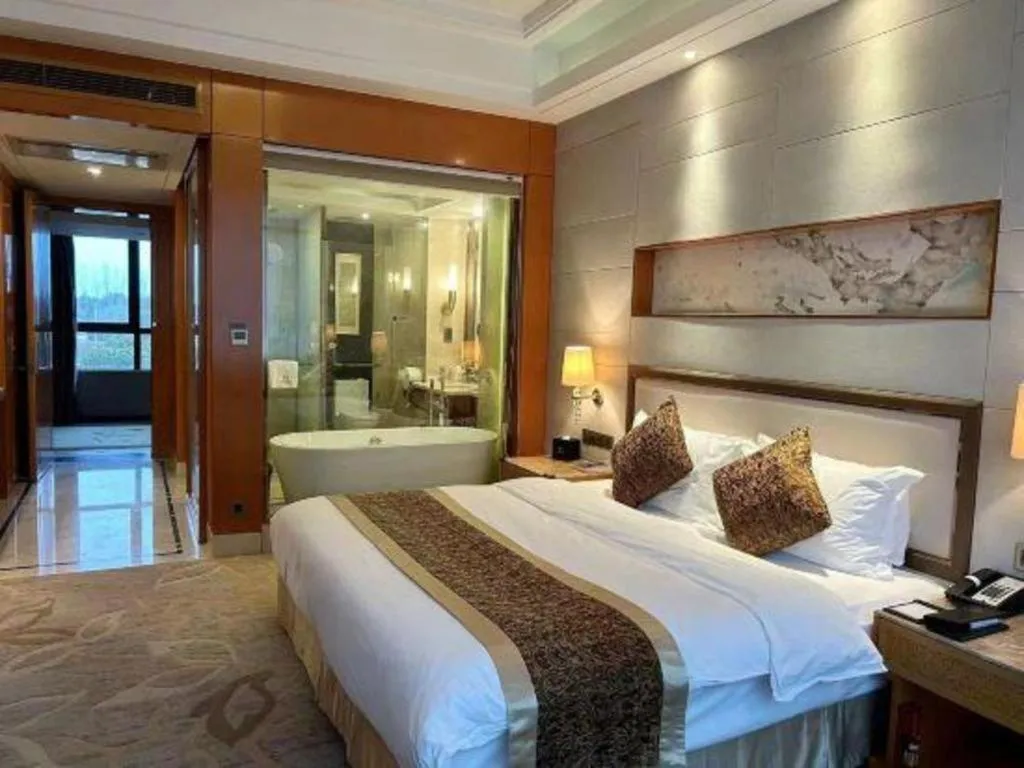 Bed in Mingdu Ziwei Garden Hotel