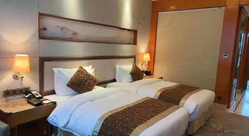 Bed in Mingdu Ziwei Garden Hotel