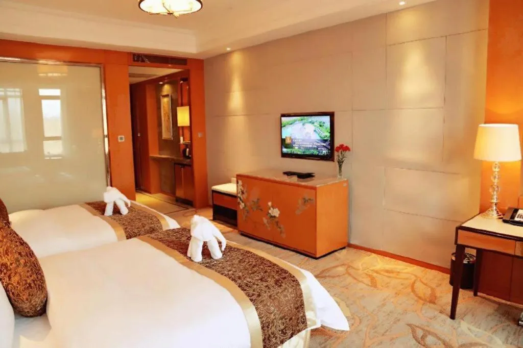 Bed in Mingdu Ziwei Garden Hotel