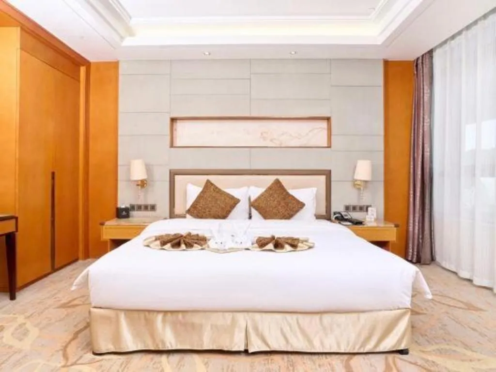Bed in Mingdu Ziwei Garden Hotel