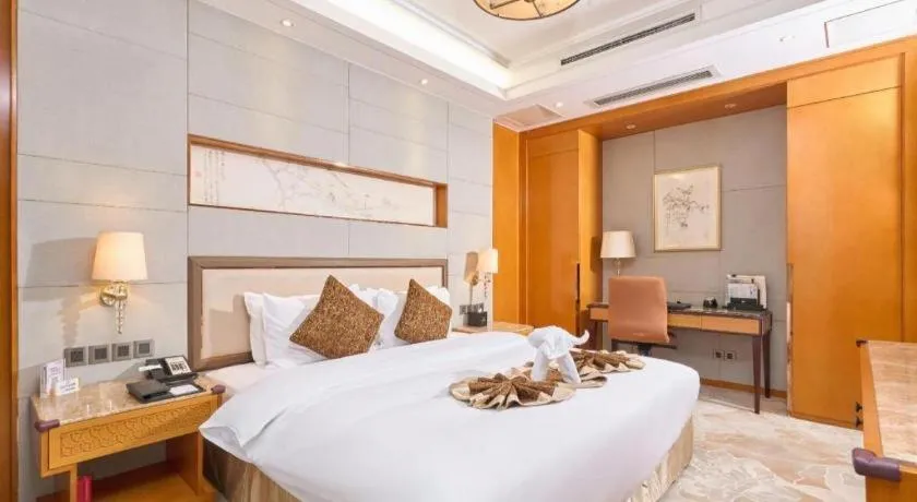 Bed in Mingdu Ziwei Garden Hotel