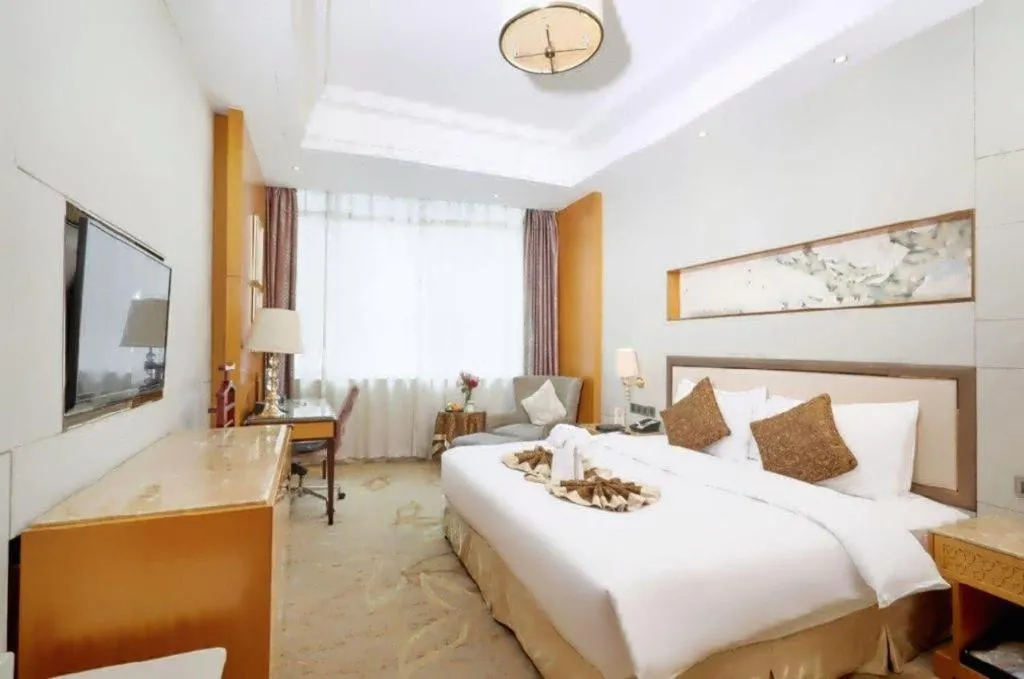 Bed in Mingdu Ziwei Garden Hotel