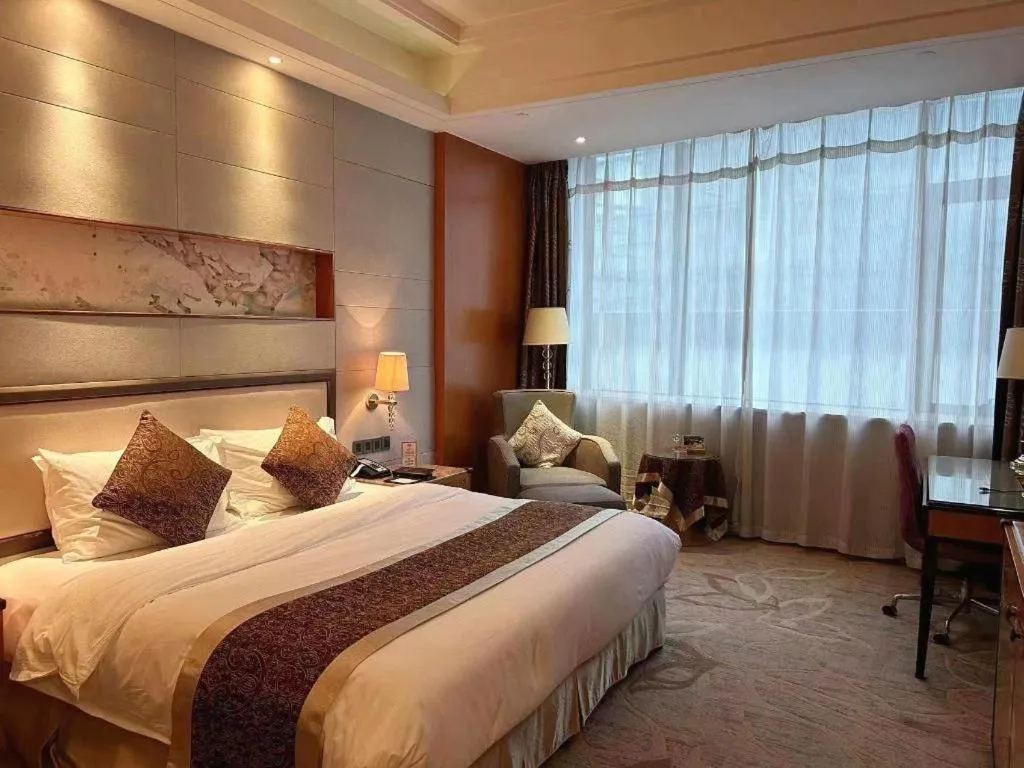 Bed in Mingdu Ziwei Garden Hotel