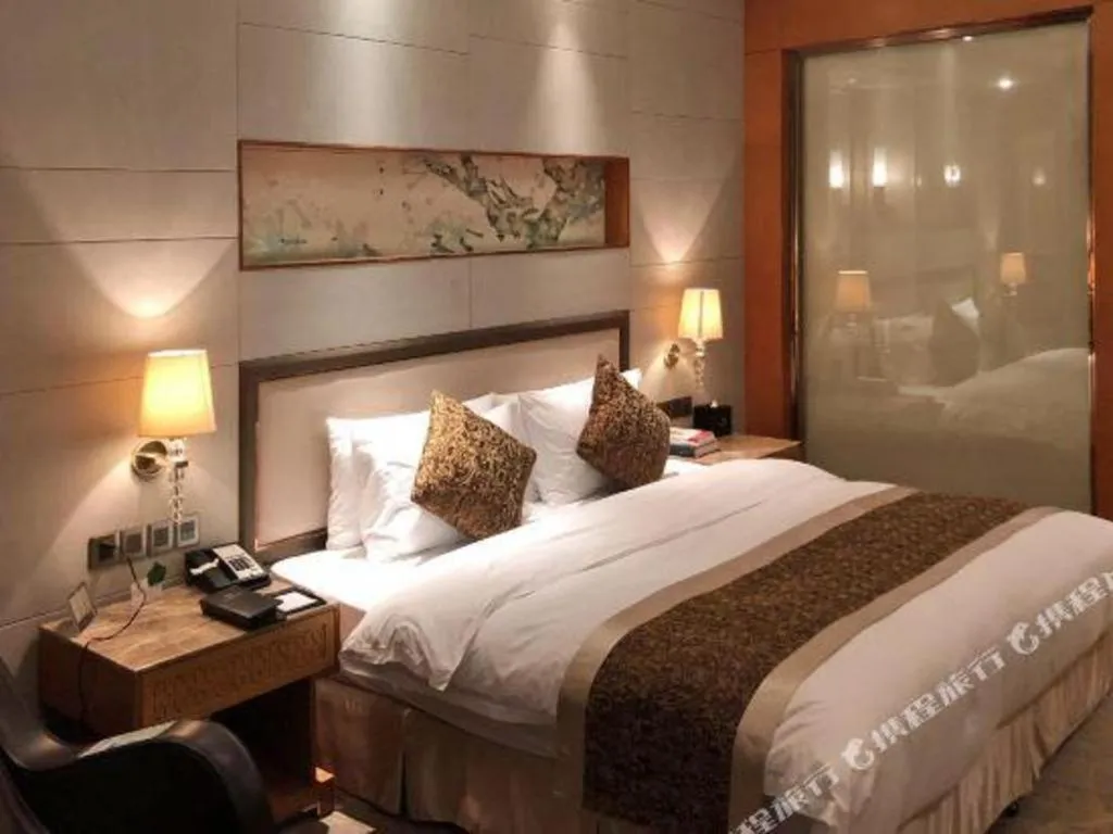 Bed in Mingdu Ziwei Garden Hotel