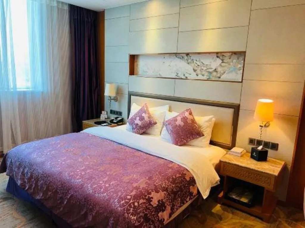 Bed in Mingdu Ziwei Garden Hotel