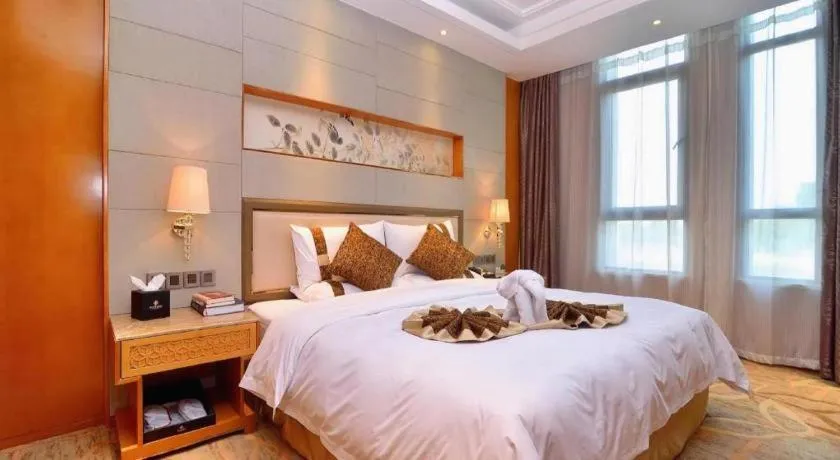 Bed in Mingdu Ziwei Garden Hotel