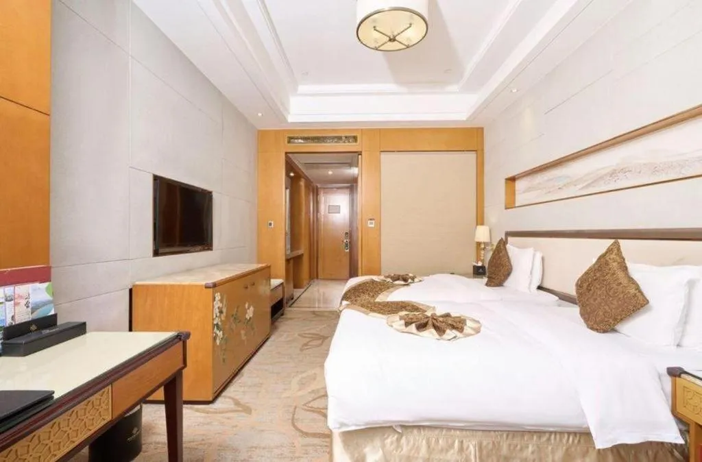 Bed in Mingdu Ziwei Garden Hotel