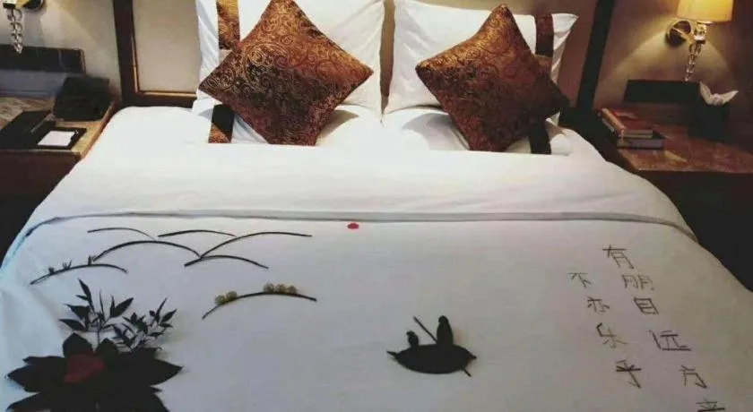 Bed in Mingdu Ziwei Garden Hotel