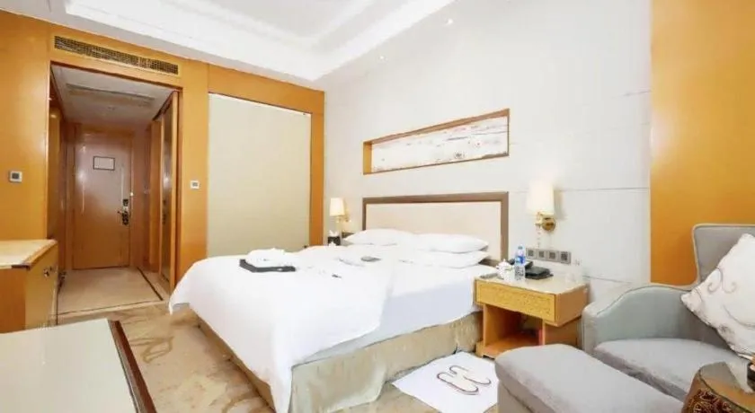 Bed in Mingdu Ziwei Garden Hotel