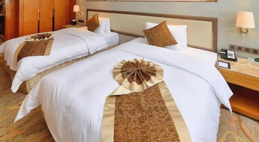 Bed in Mingdu Ziwei Garden Hotel