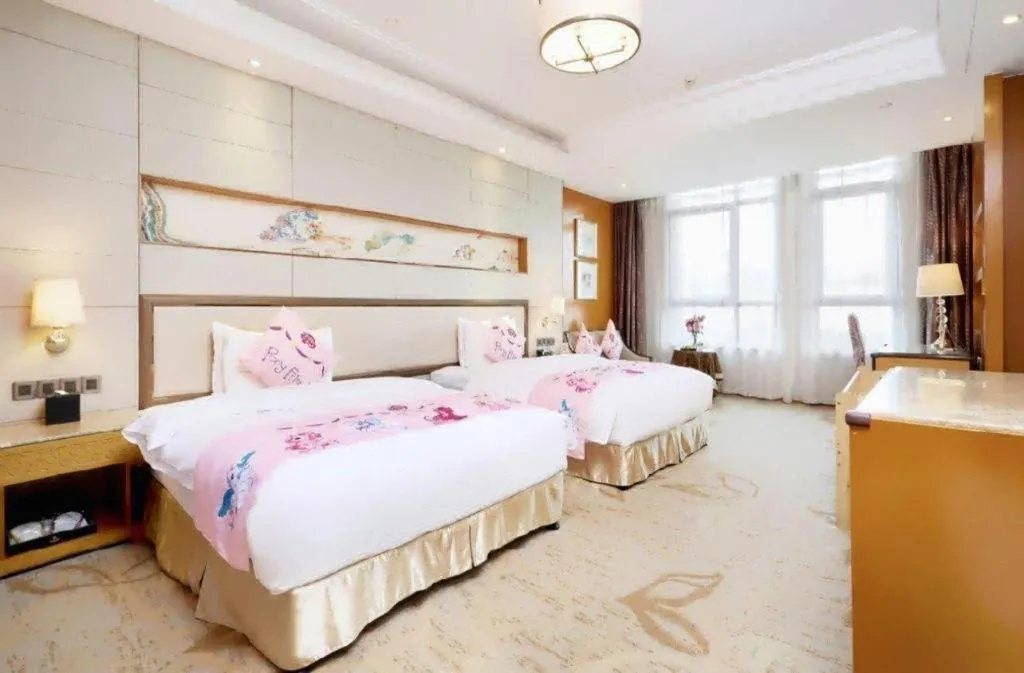 Bed in Mingdu Ziwei Garden Hotel