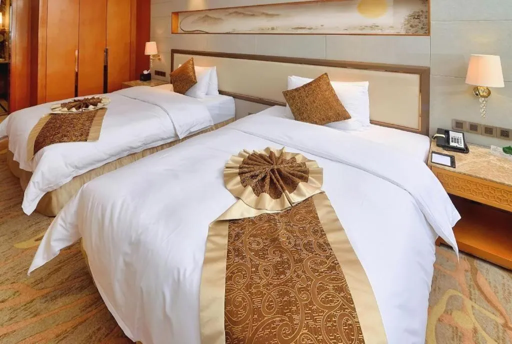 Bed in Mingdu Ziwei Garden Hotel