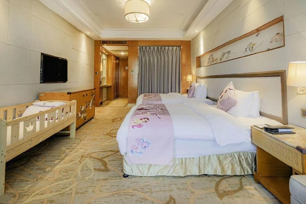 Bed in Mingdu Ziwei Garden Hotel