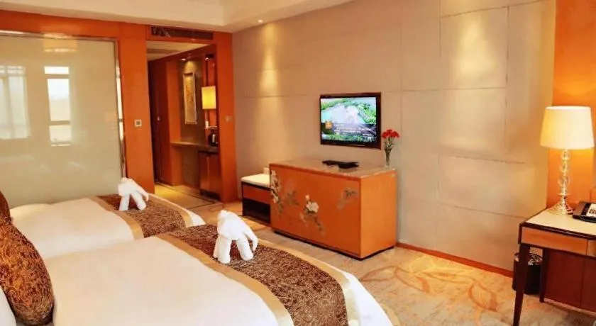 Bed in Mingdu Ziwei Garden Hotel