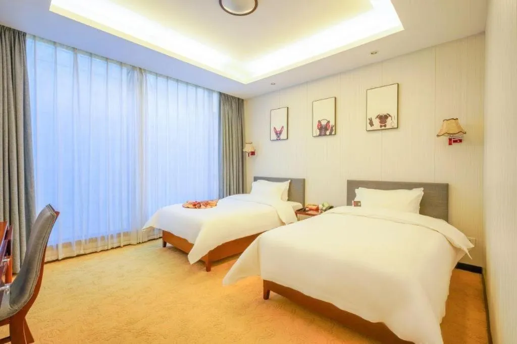 Bed in Suzhou Phoenix Hotspring Resort