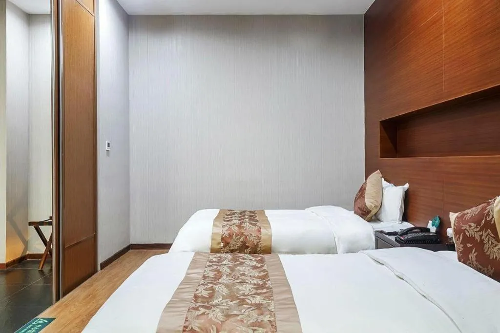 Bed in Suzhou Phoenix Hotspring Resort