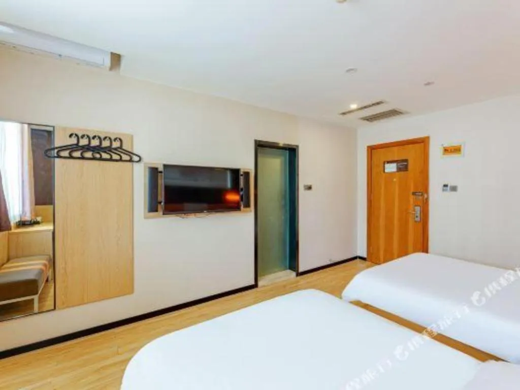 Bed in IU Hotel Tianjin Youyi Road Meijiang Exhibition Meiniu Metro Station