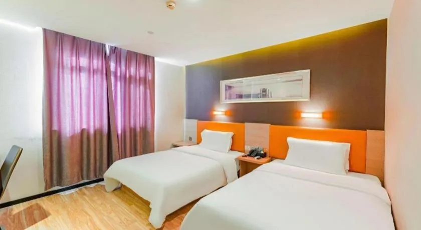 Bed in IU Hotel Tianjin Youyi Road Meijiang Exhibition Meiniu Metro Station