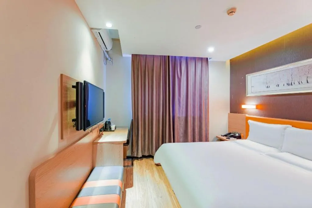 Bed in IU Hotel Tianjin Youyi Road Meijiang Exhibition Meiniu Metro Station
