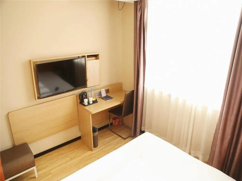 Bed in IU Hotel Tianjin Youyi Road Meijiang Exhibition Meiniu Metro Station