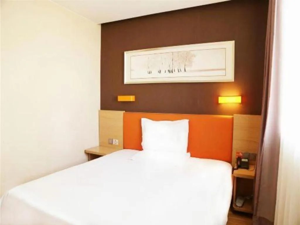 Bed in IU Hotel Tianjin Youyi Road Meijiang Exhibition Meiniu Metro Station