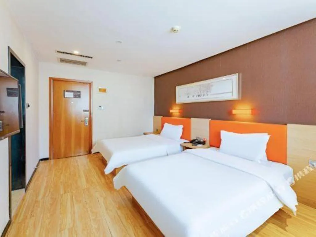 Bed in IU Hotel Tianjin Youyi Road Meijiang Exhibition Meiniu Metro Station