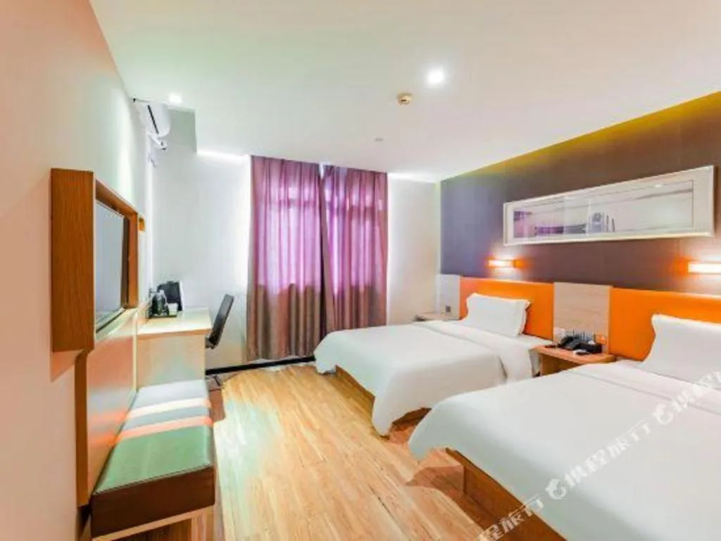 Bed in IU Hotel Tianjin Youyi Road Meijiang Exhibition Meiniu Metro Station