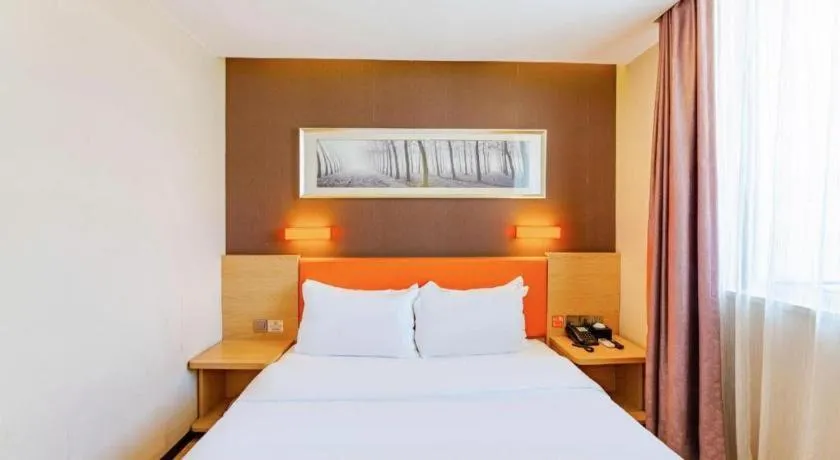 Bed in IU Hotel Tianjin Youyi Road Meijiang Exhibition Meiniu Metro Station