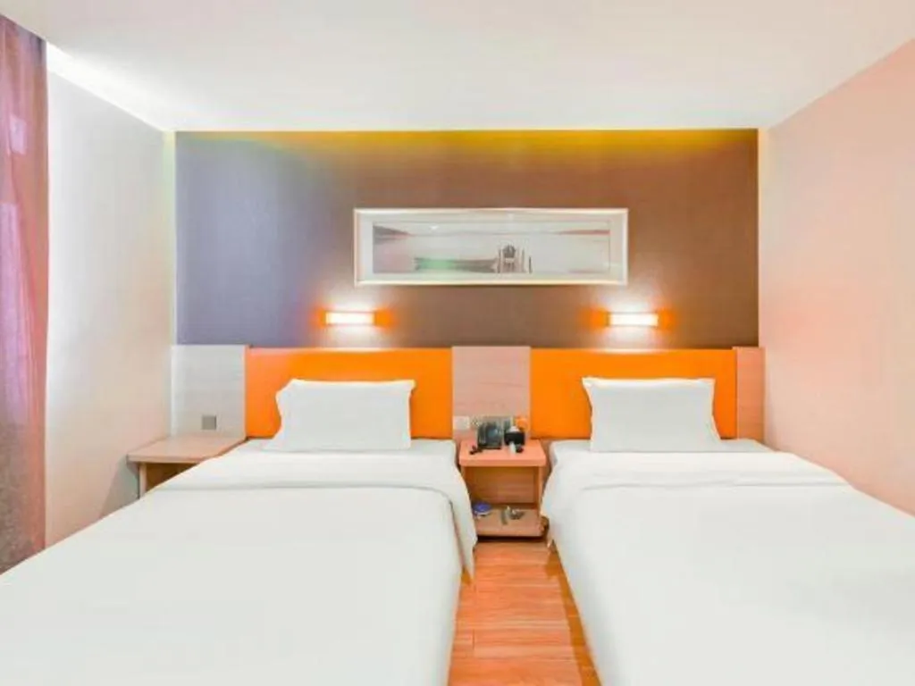 Bed in IU Hotel Tianjin Youyi Road Meijiang Exhibition Meiniu Metro Station