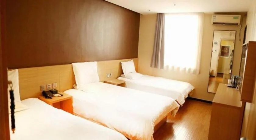 Bed in IU Hotel Tianjin Youyi Road Meijiang Exhibition Meiniu Metro Station