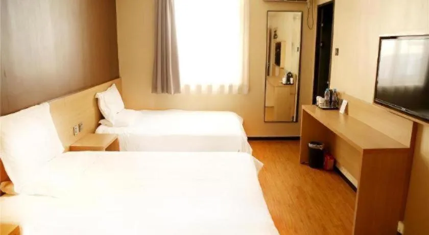 Bed in IU Hotel Tianjin Youyi Road Meijiang Exhibition Meiniu Metro Station