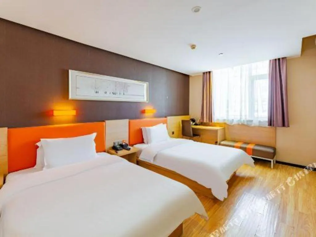 Bed in IU Hotel Tianjin Youyi Road Meijiang Exhibition Meiniu Metro Station