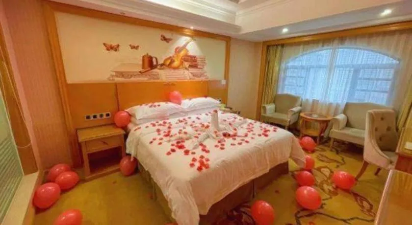 Bed in Vienna Hotel Guangxi Liuzhou Xijiang Vientiane City