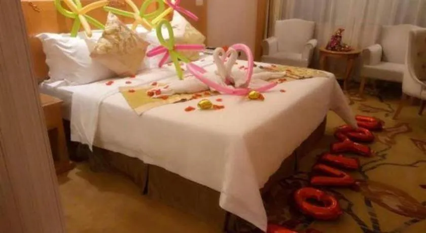 Bed in Vienna Hotel Guangxi Liuzhou Xijiang Vientiane City