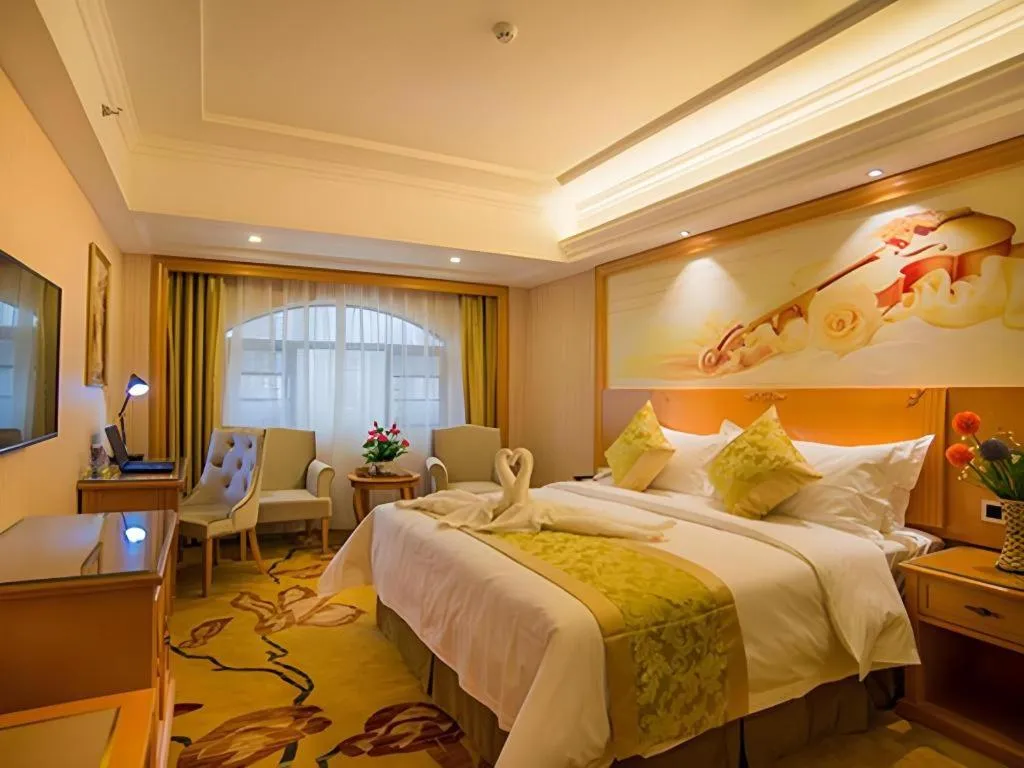 Bed in Vienna Hotel Guangxi Liuzhou Xijiang Vientiane City