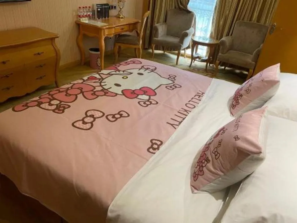 Bed in Vienna Hotel Guangxi Liuzhou Xijiang Vientiane City