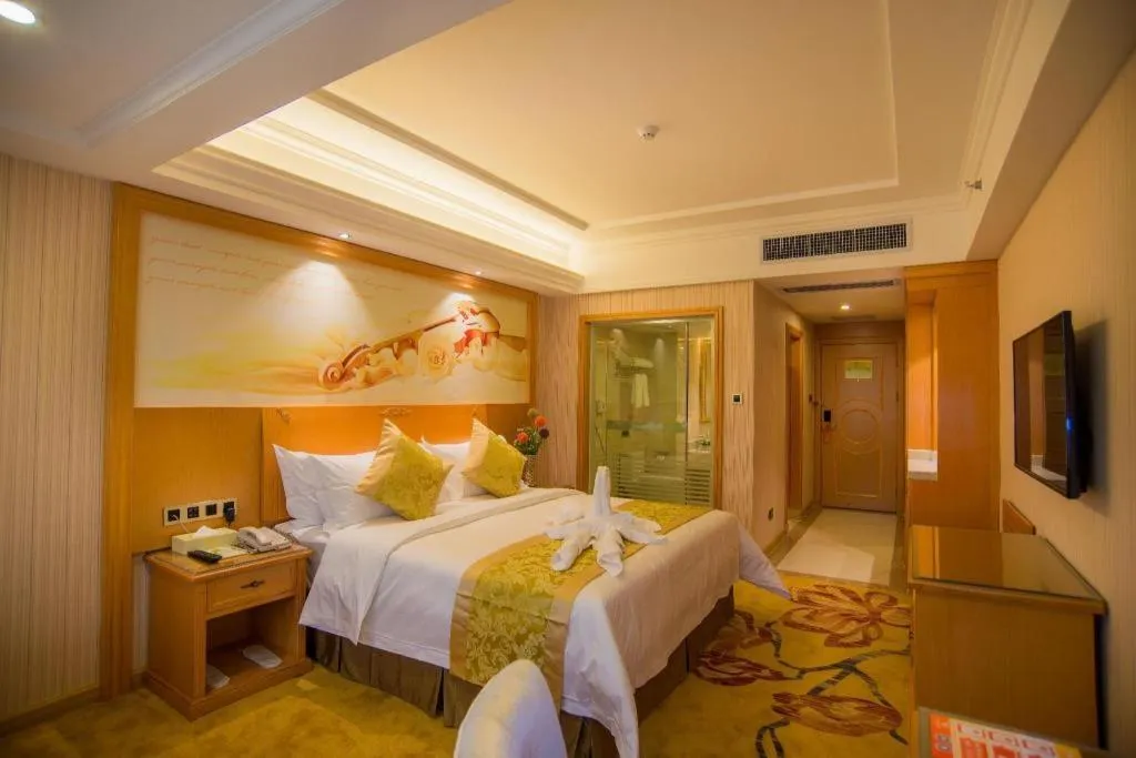 Bed in Vienna Hotel Guangxi Liuzhou Xijiang Vientiane City
