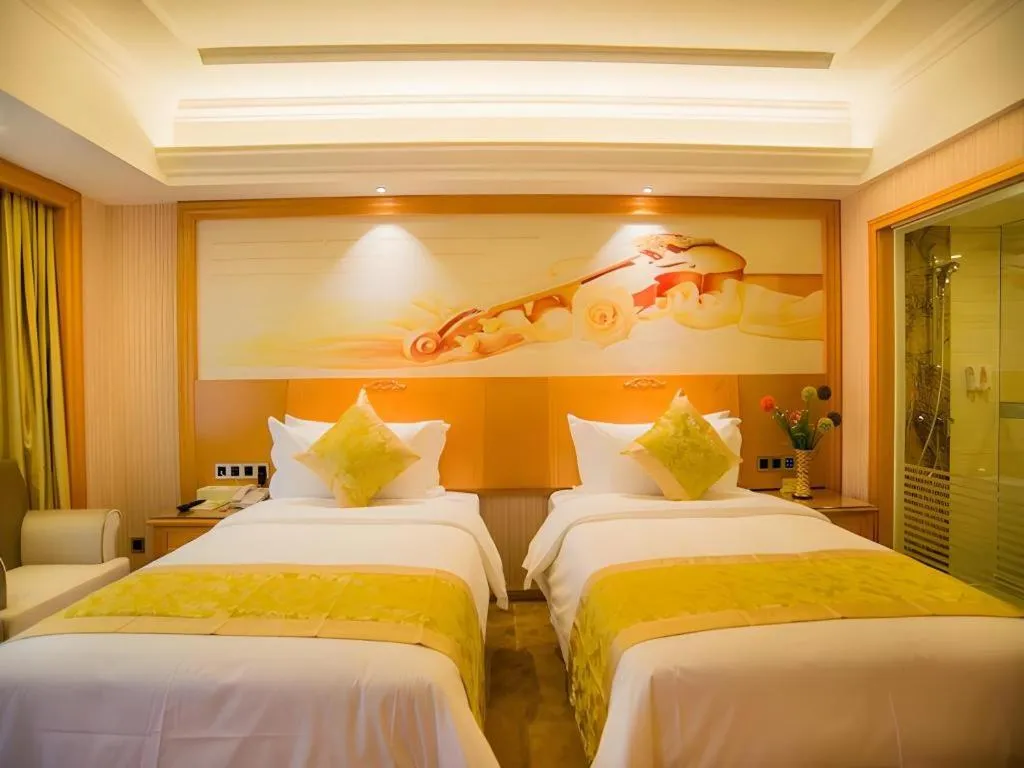 Bed in Vienna Hotel Guangxi Liuzhou Xijiang Vientiane City