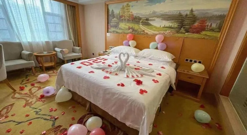 Bed in Vienna Hotel Guangxi Liuzhou Xijiang Vientiane City