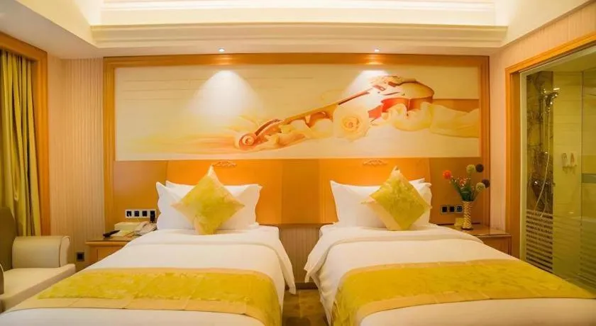 Bed in Vienna Hotel Guangxi Liuzhou Xijiang Vientiane City