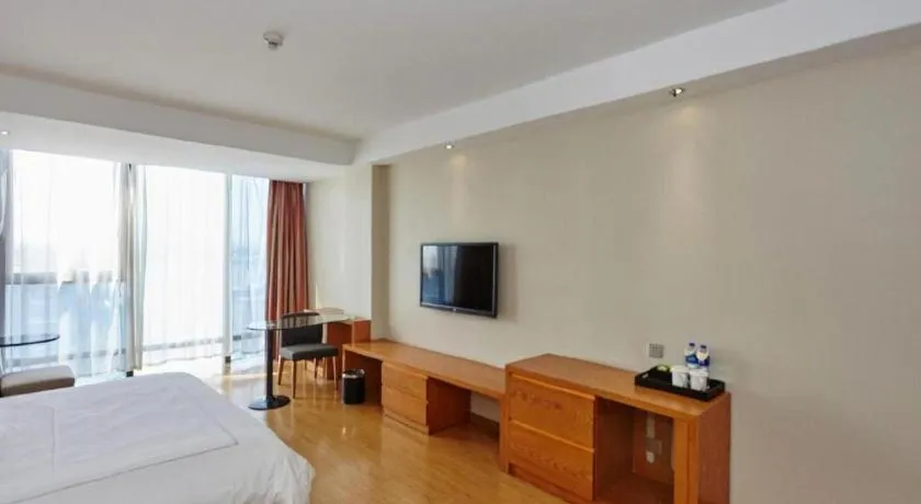 Bed in Warmly Hotel Suzhou Shuanghuwan