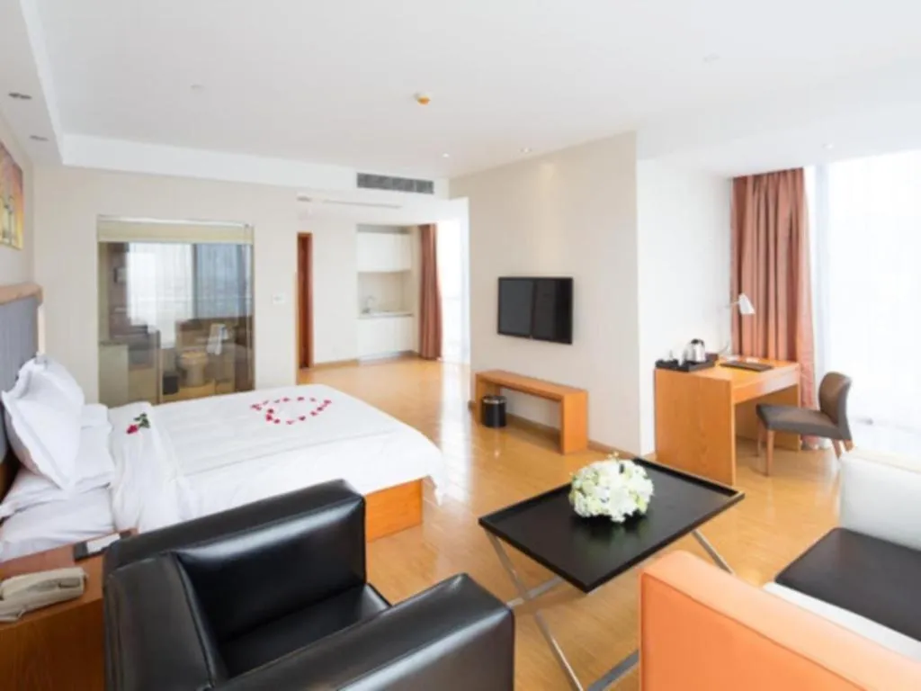 Bed in Warmly Hotel Suzhou Shuanghuwan