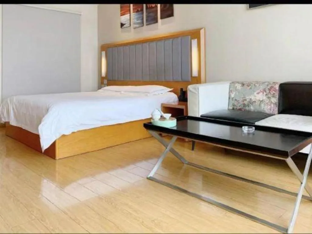 Bed in Warmly Hotel Suzhou Shuanghuwan