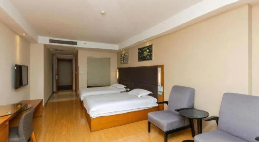 Bed in Warmly Hotel Suzhou Shuanghuwan