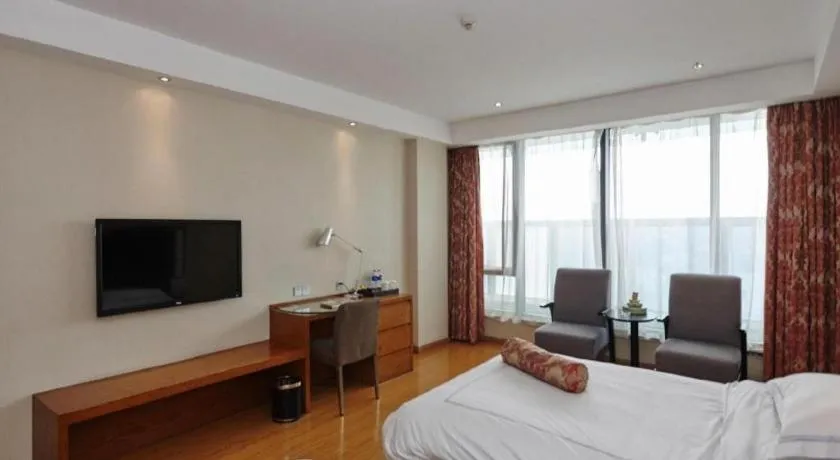 Bed in Warmly Hotel Suzhou Shuanghuwan